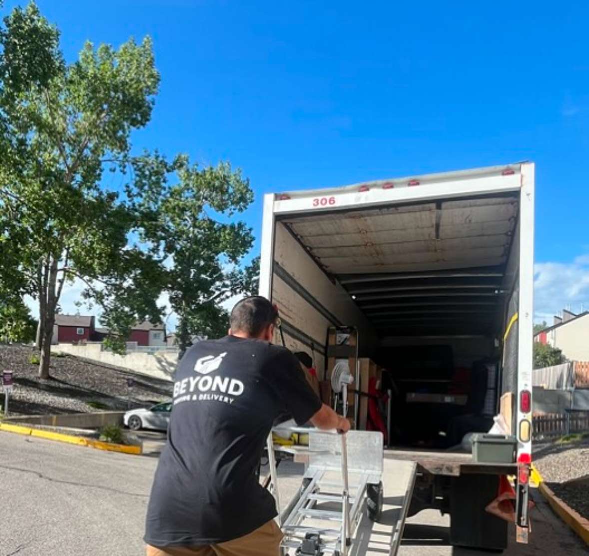Movers in Lethbridge protecting furniture during a move